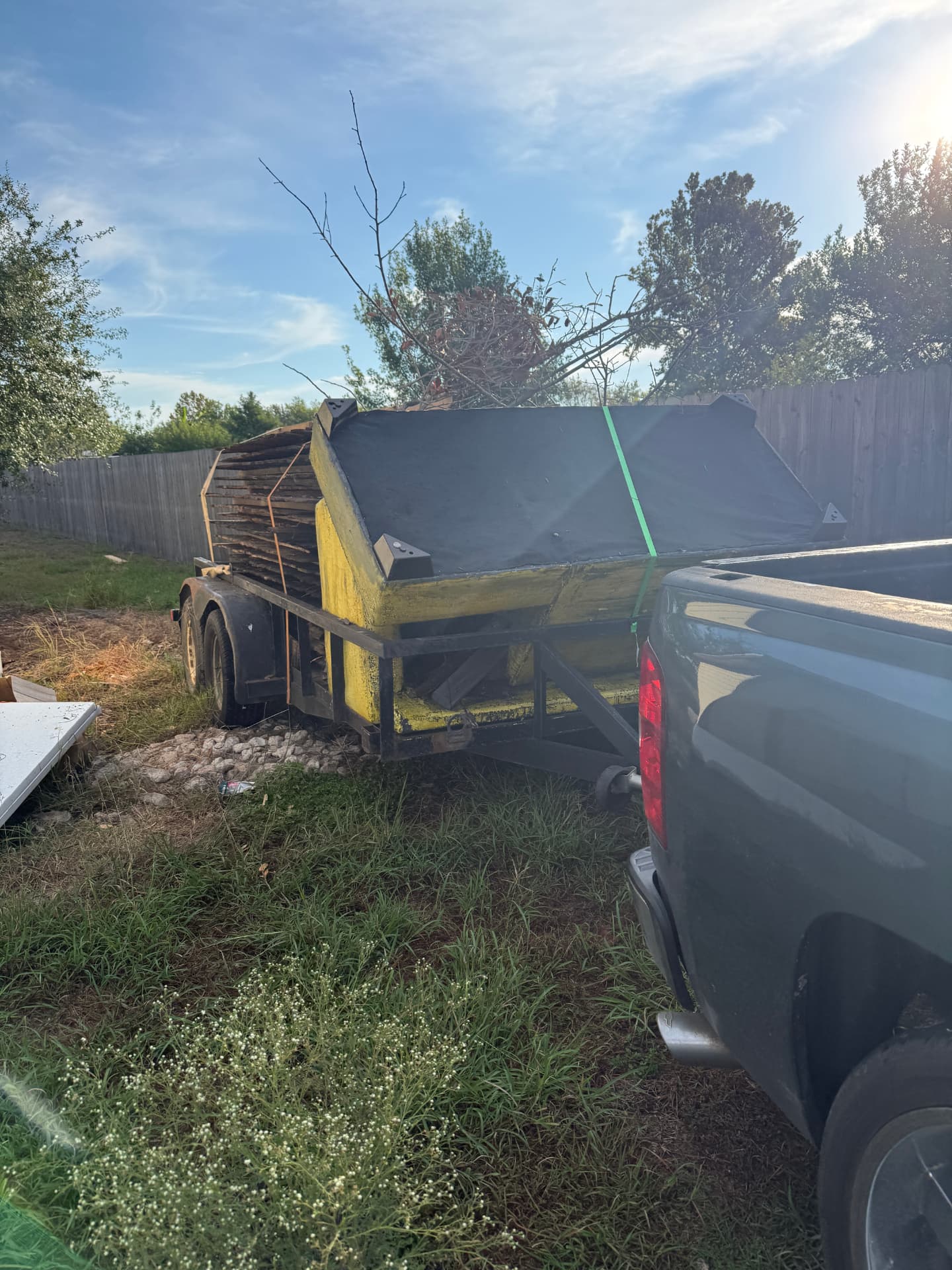 Backyard wood & branch removal loaded on our trailer